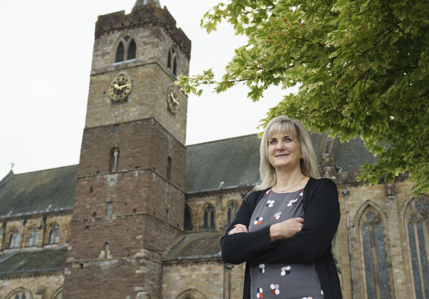 WJM Dunblane Make Contribution to Dunblane Cathedral Book